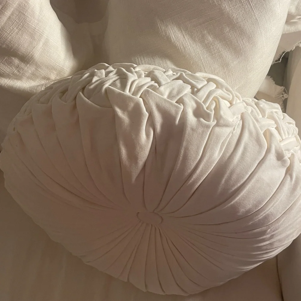 Round white velvet tufted pillow